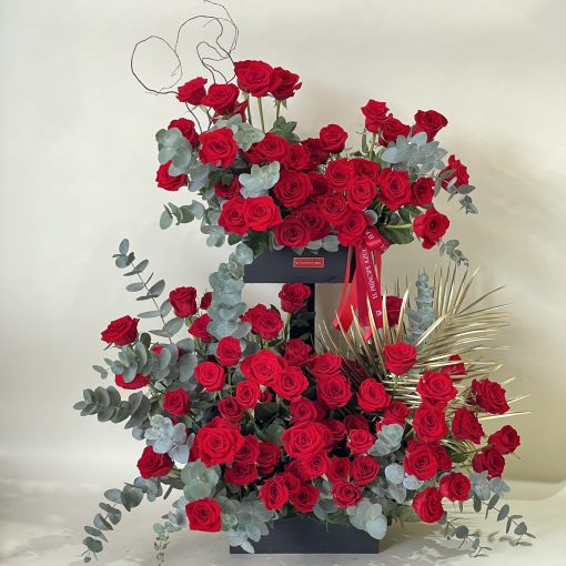 arreglo de flores con rosas